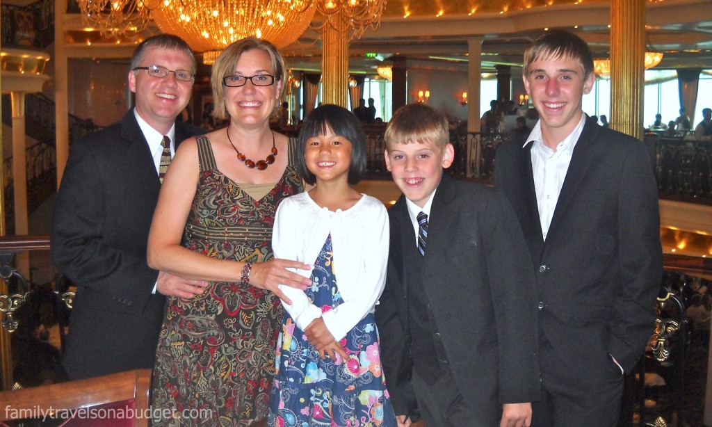 Family dressed up for formal night on a cruise ship