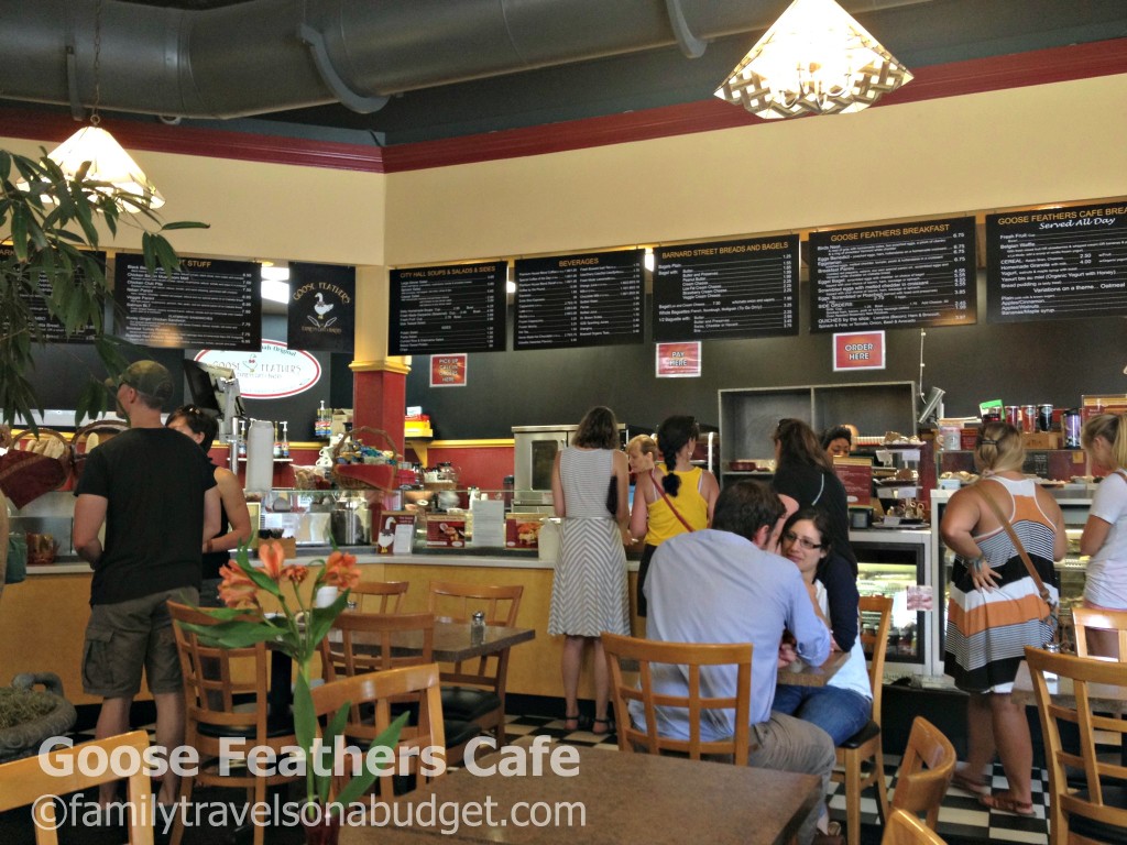 Goose Feathers Cafe serves the best breakfast in Savannah, Georgia showing the menu boards, tables and dining patrons
