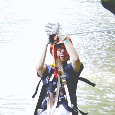 Me smiling in my gear at the Hocking Hills ziplining tour