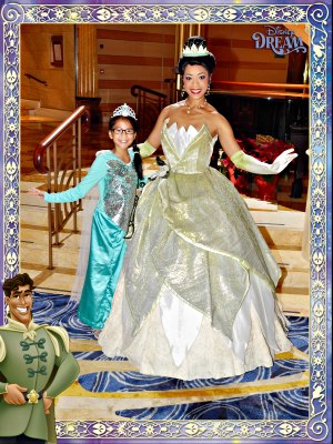 Girl dressed as Elsa posing with Tiana on the Disney Dream.