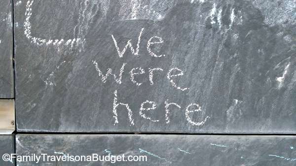 The Freedom of Speech wall in Downtown Charlottesville VA, with the words "we were here."