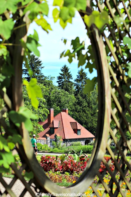 Historic gardens as seen through a flower arbor at the Biltmore House in North Carolina.