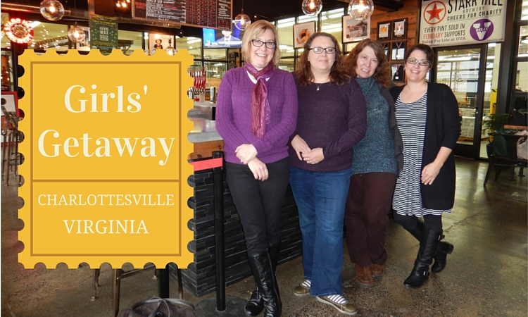 Girls' weekend getaway ideas: Charlottesville. Title image shows four friends at a local brewery with the words" Girls' Getaway: Charlottesville, VA"
