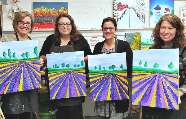 Four ladies showing our paintings on a girlfriend getaway to Charlottesville, VA.