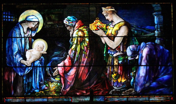 Stained glass window at Faith Chapel on Jekyll Island in Georgia, depicting baby Jesus and the three wise men.