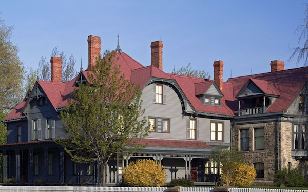 James A Garfield home in gray with red roof and multiple fireplaces,  One of many Ohio presidents homes to see.