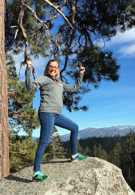 Posing at the top of a rock overlooking Lake Tahoe.