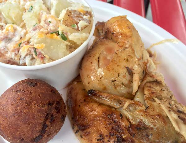 Coney Bar B Cue roasted chicken with loaded baked potato salad and hush puppy at Kings Island