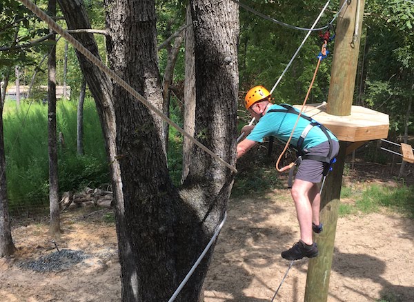 Facing obstacles on a high ropes course can be tough