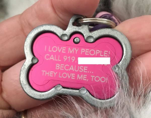 Dog tag with words, "I love my people. Call XXX because they love me too."
