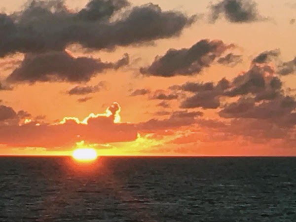 RCCL's Enchantment of the Seas sunset over the ocean