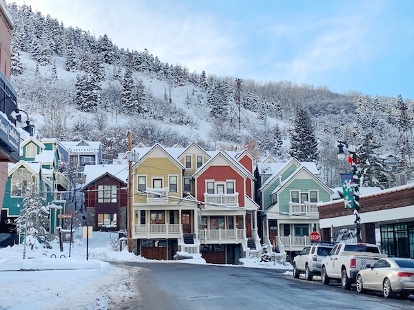 Downtown Park City with snow covered mountains in the background