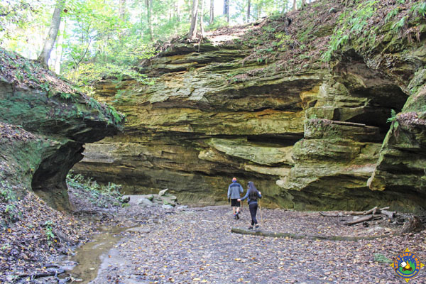 Two people hiking along a trail at Turkey Run State Park In Indiana.