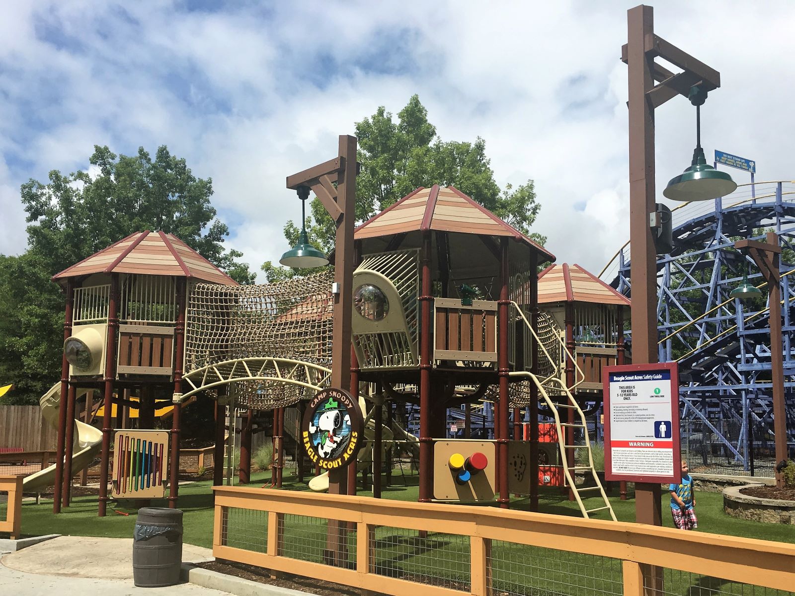 Camp Snoopty playground at Carowinds with slides, climbing nets and other free play