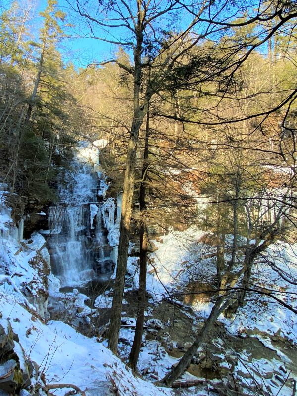 Ganoga Falls frozen and snow covered at Ricketts Glen State Park in Pennsylvania.