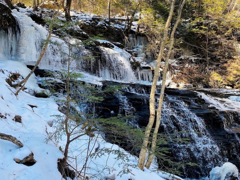 Frozen waterfalls seen hiking at Ricketts Glen in winter.