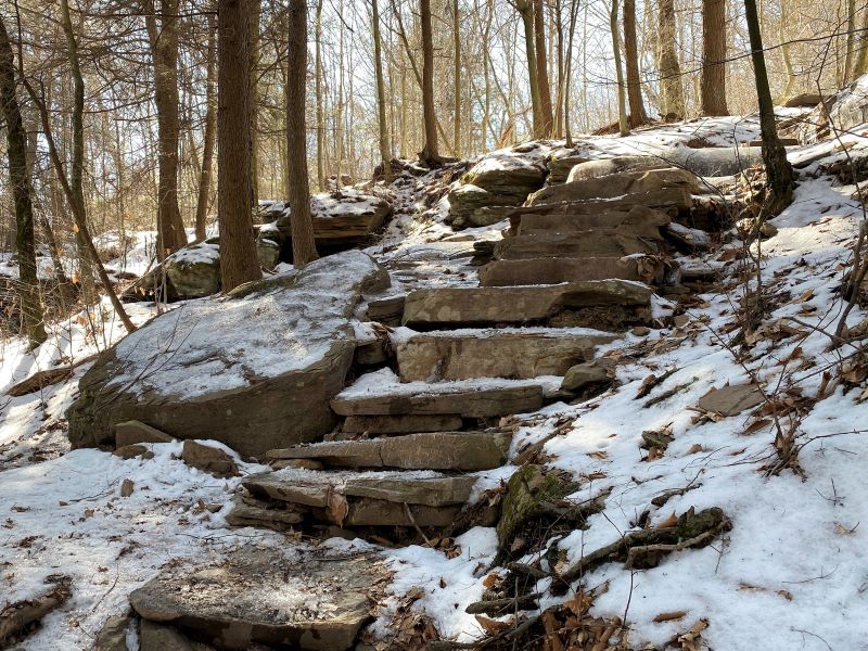 Snow covered rock steps at Ricketts Glen in winter.