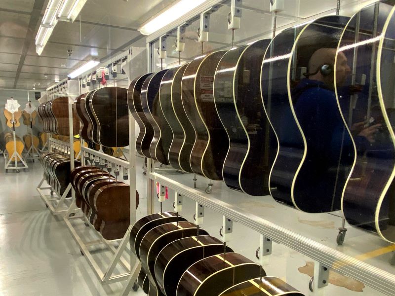 Rows of guitars at Martin Guitar Factory in the process of being finished.