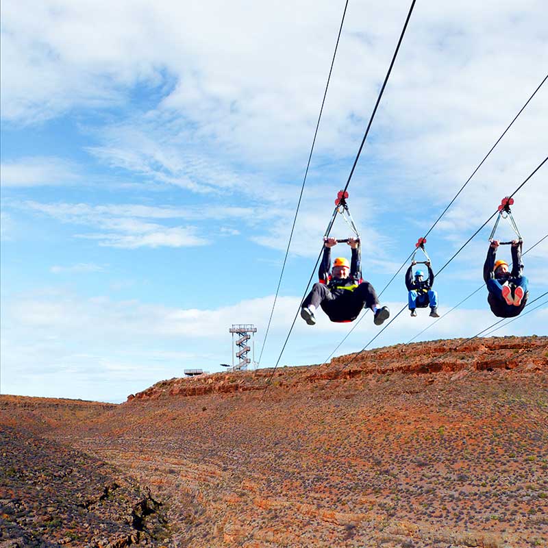 Ziplining at Grand Canyon West, an activity provided by the Hualapai tribe for Grand Canyon vacations for families