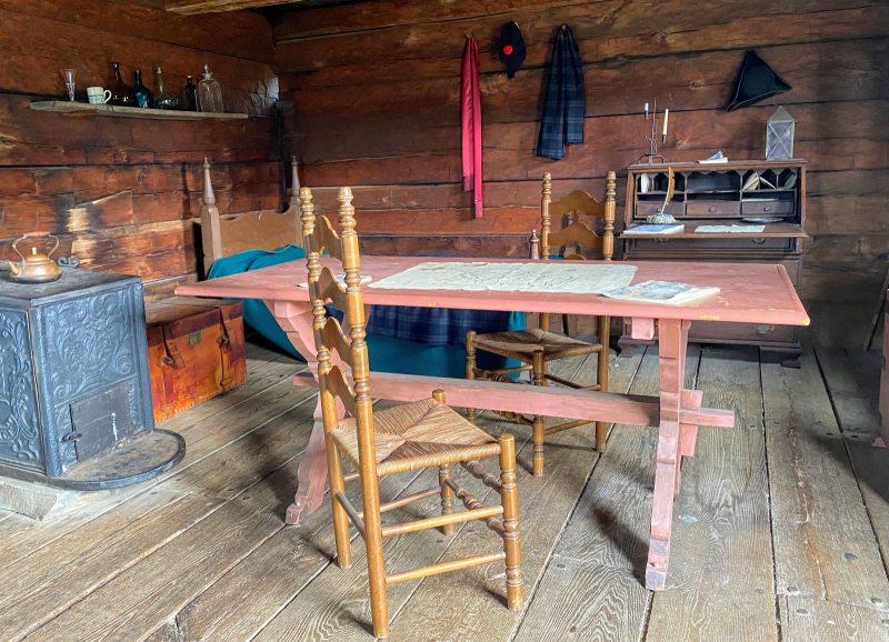 Officer's quarters at Fort Ligonier show work table, wood stove and personal effects