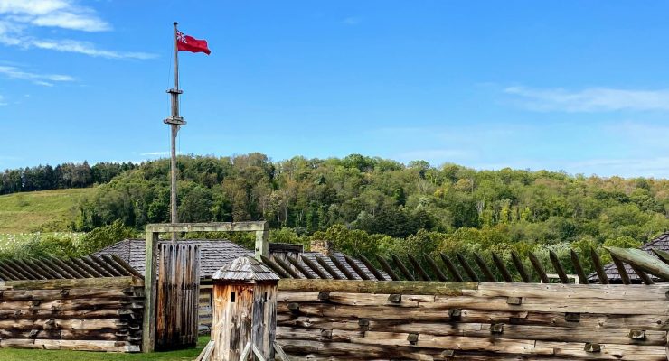 Fort Ligonier with British Flag and mountains behind
