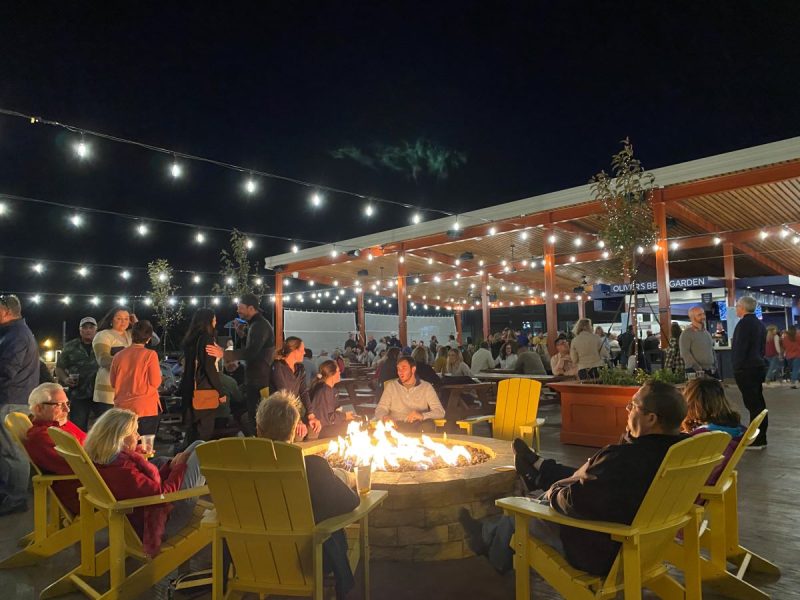 Outdoor dining and entertainment area at Oliver's Beer Garden in Erie, PA