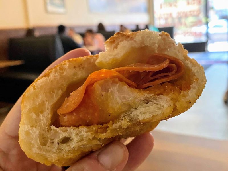 Pepperoni ball from Stevos in Erie, shows the pepperoni and airy dough that makes it famous