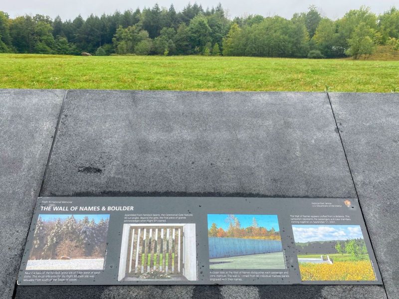 Interpretation board at Memorial Plaza overlooking the boulder marking the southernmost spot of impact of Flight 93.