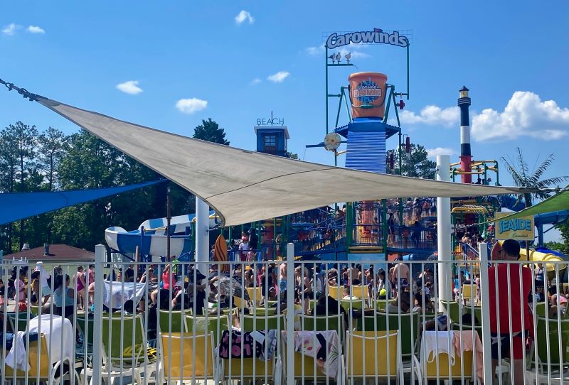 Seaside Splashworks dumping water bucket at Carowinds, with lounge chairs in foreground