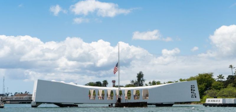Pearl Harbor in Honolulu, Hawaii witih flag at half mast
