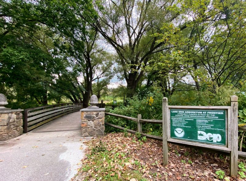 Walkway and sign at the Lake Erie Arboretum, a large park in Erie, PA