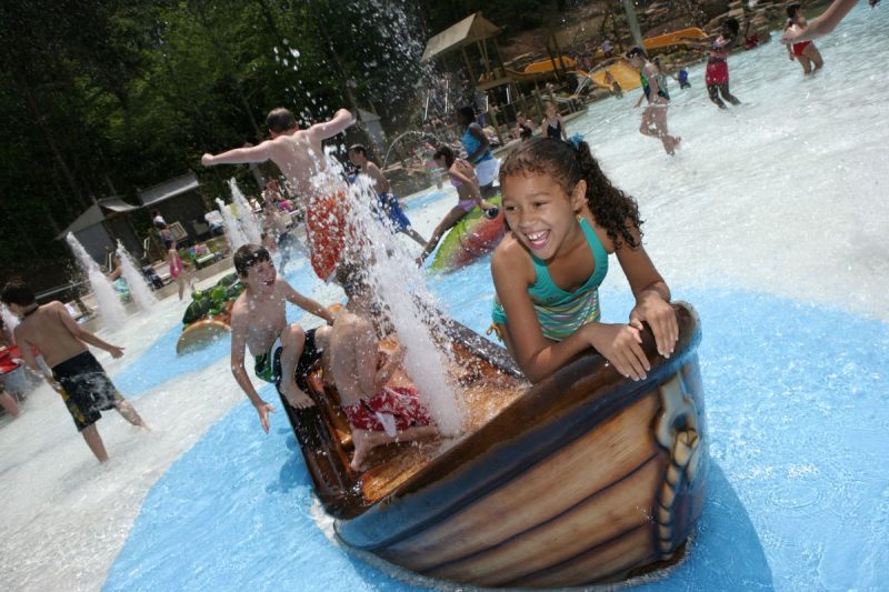 Kids enjoying a water attraction at Dollywood's Splash Country in Pigeon Forge