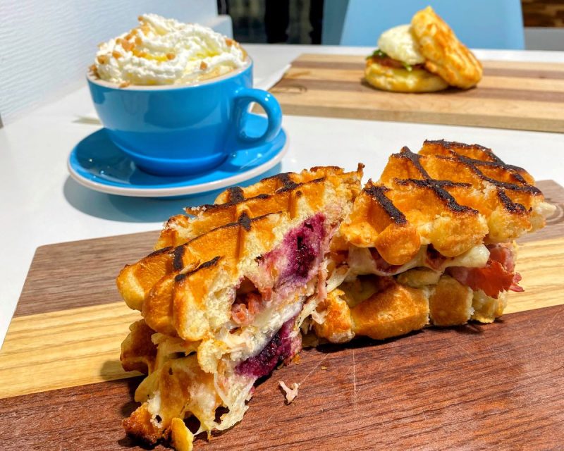 Belgian monte cristo and salted caramel coffee in blue mug with whipped cream at 18 Grams Coffee Lab, Culpeper, VA restaurant