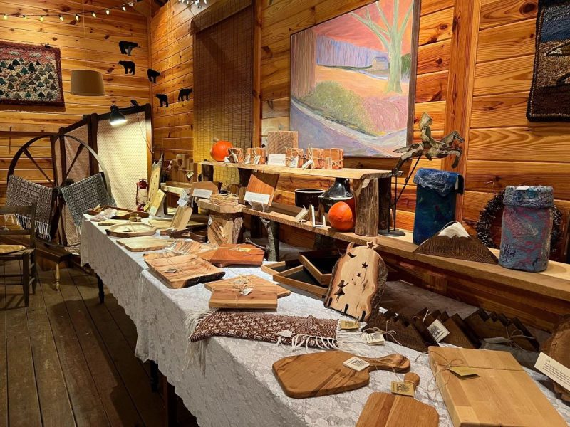 Selection of handcrafted wood items, paintings, and other art for sale at Oak Shade Farm in Culpeper, VA