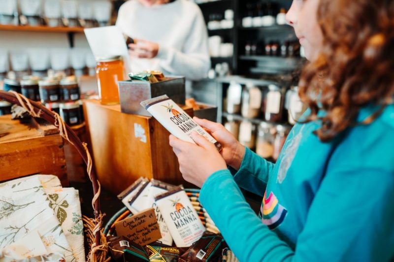 People looking at the chocolate bars at Cocoa Manna in Culpeper, VA