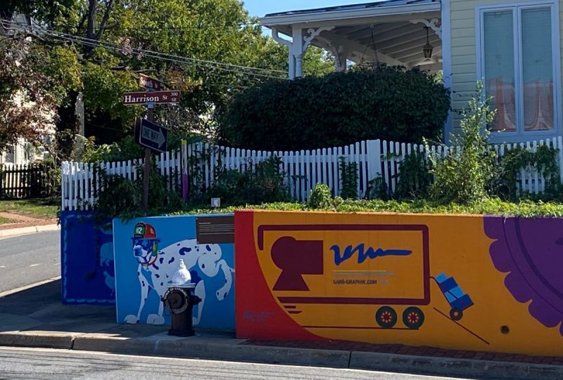 Dog mural near Raflo Park in Leesburg, VA is one of many murals in town. For things to do in Loudoun County with kids, a mural hunt is fun.