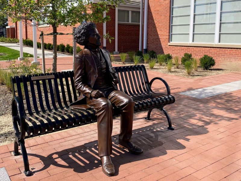 Park Bench with Frederick Douglass Statue outside the Douglass High School Campus in Leesburg, VA