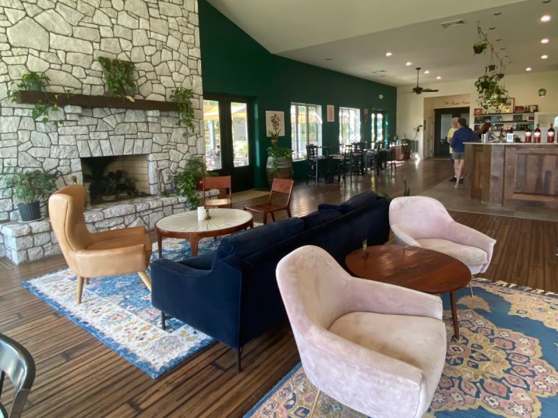 Fireplace and seating area in the tasting room at Walsh Family Wine