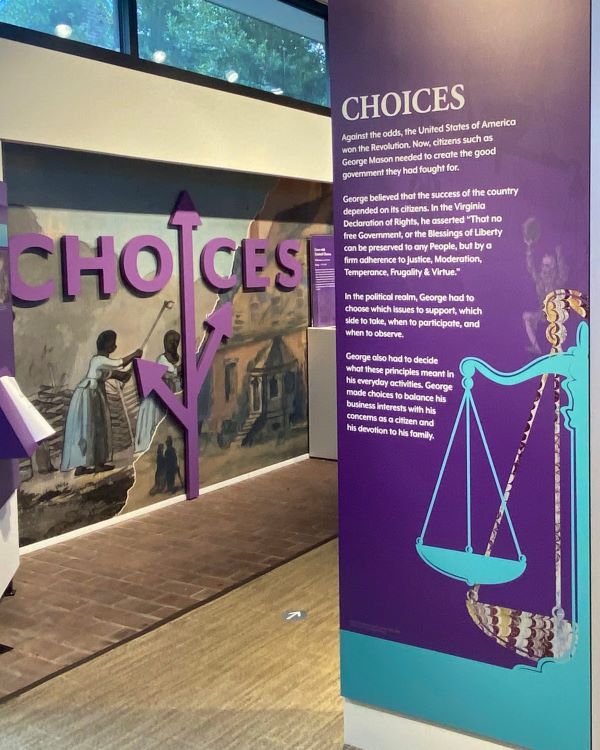 Purple and teal exhibit at Gunston Hall that shares the struggle George Mason had about balancing the government needs, individual needs and his families needs regarding slavery