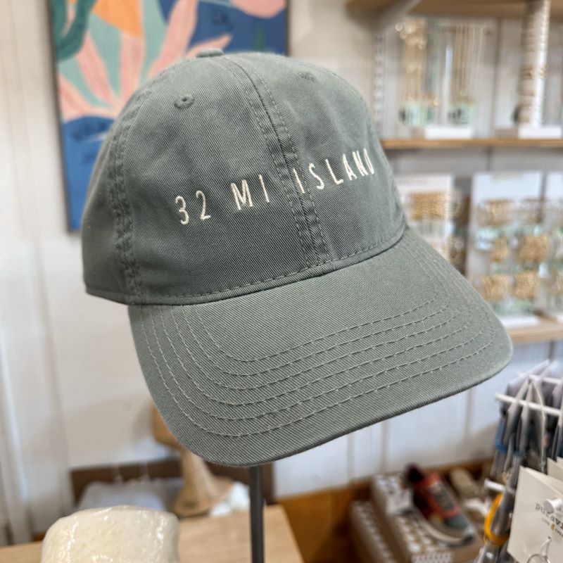 Gray hat with "32 Mi Island" on front.