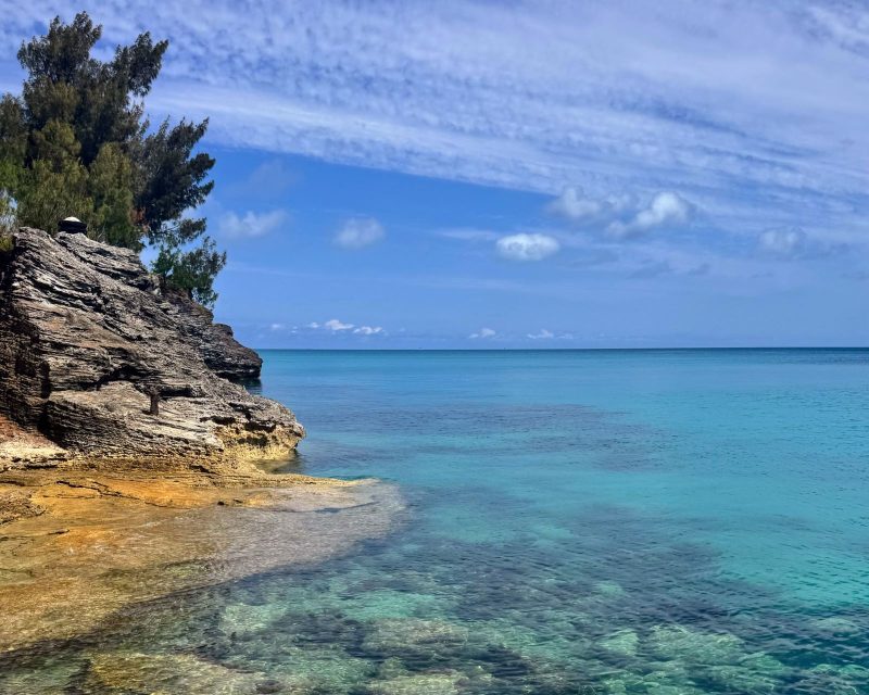 Clear water and cliffs at Clarence Cove Beach in Bermuda.