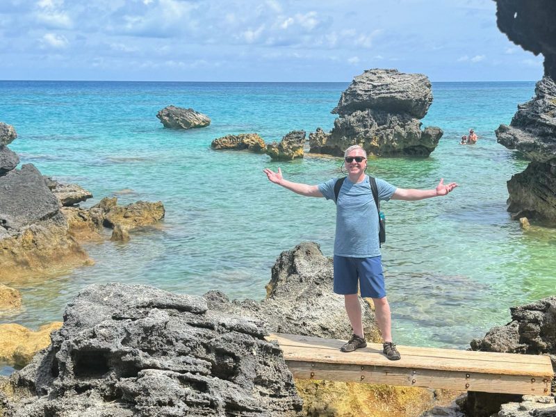 Happy guy in sunglasses at Tobacco Bay Park in Bermuda.