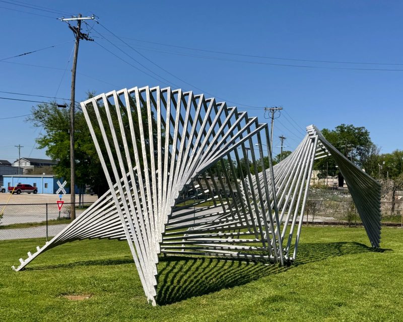 Star Center by Linda Howard at Montague Park, brushed aluminum 8'6" x 24' x 12'.