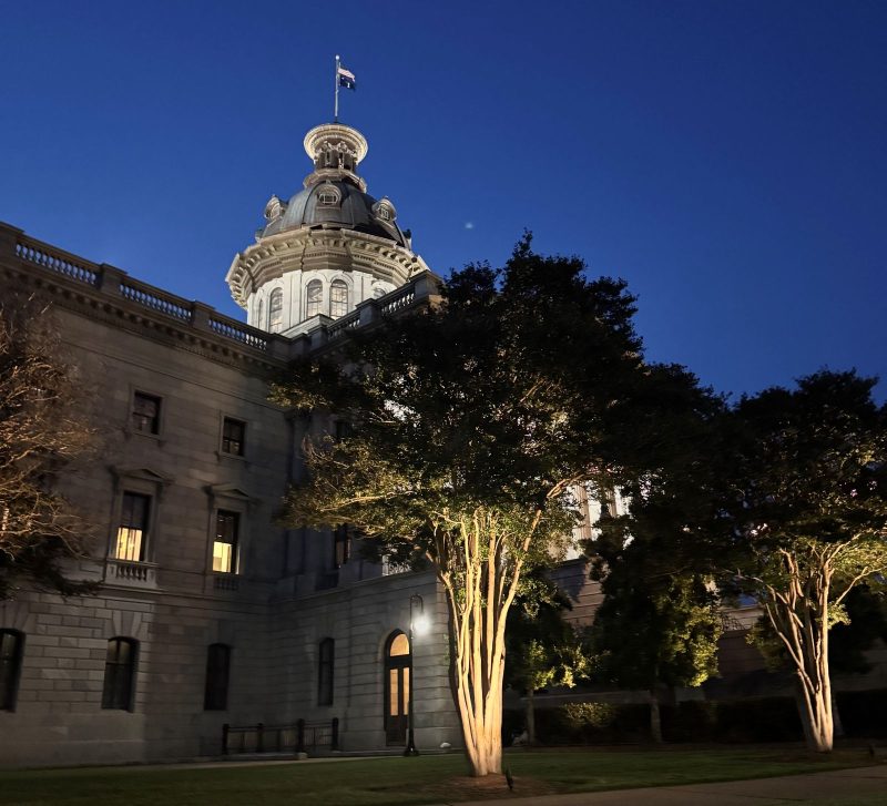 Capitol Building in Columbia, SC, with the Robert Mills designed dome lit up against the night sky.