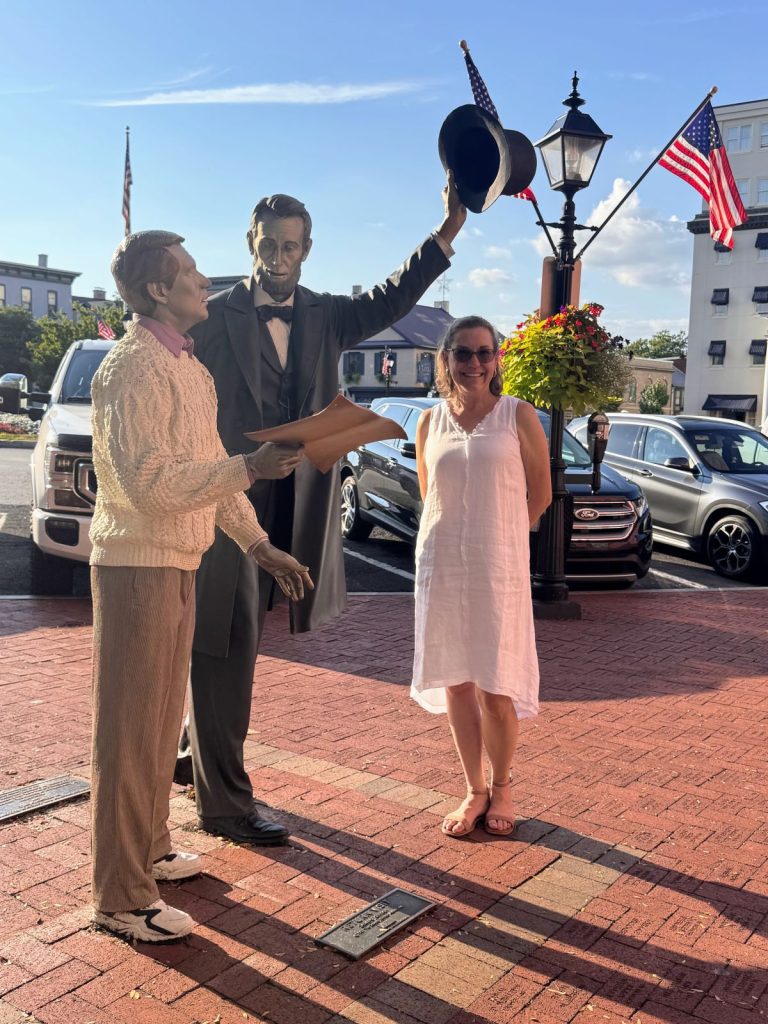 Posing next to President Lincoln's statue in Downtown Gettysburg Pennsylvania.