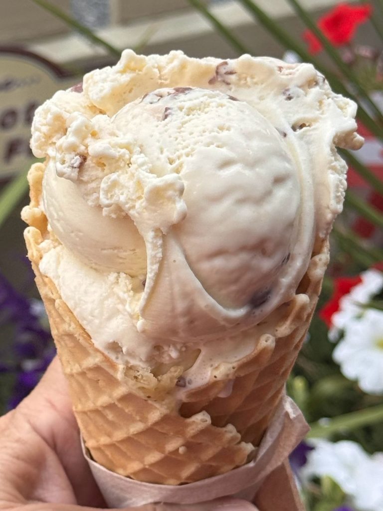 Scoop of homemade ice cream in a waffle cone from Mr. G's in Gettysburg, Pennsylvania.