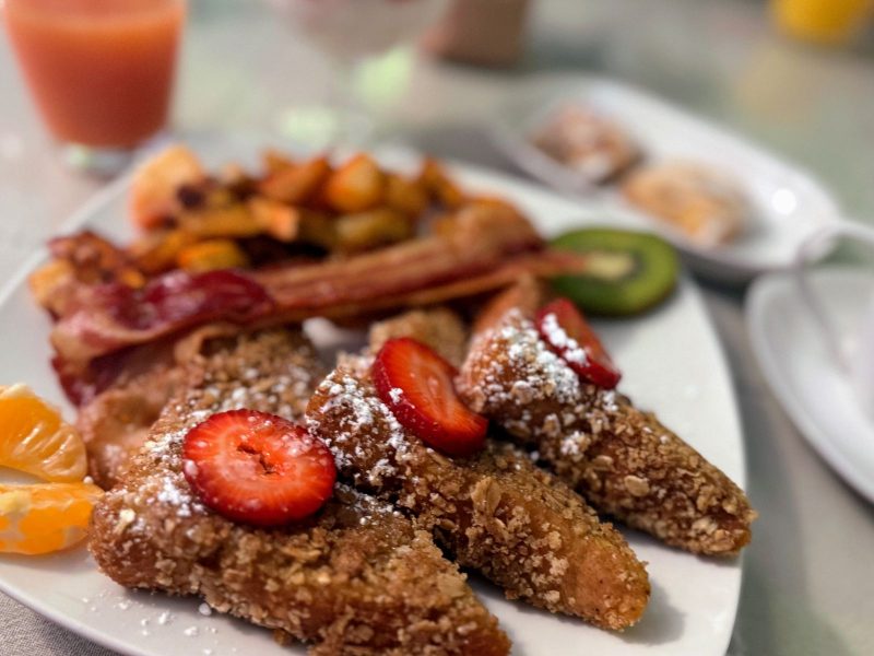 French toast with fresh fruit, bacon and roast potatoes at the Sleepy Hollow Inn B&B.