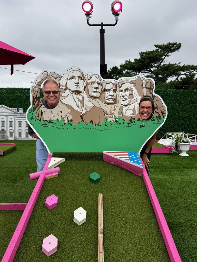 Having fun at Zelky's Roof Top Terrace Mini Golf in Rehoboth Beach.